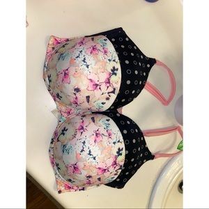 Two pink Victoria Secret bra